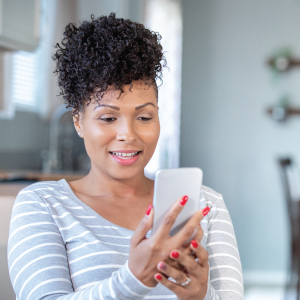 A woman completing a virtual screener for a study